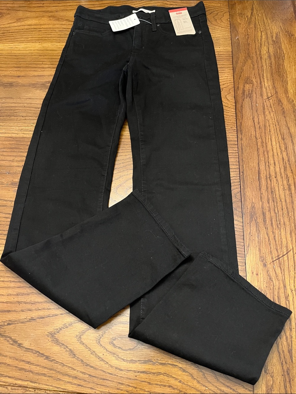 Levi’s Black 314 Shaping Straight mid-rise jeans, size 27, new with tags